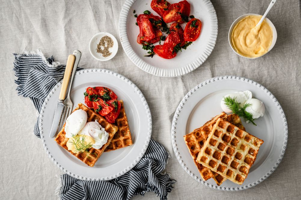 Wellbeing & Eatwell Cover Image 1001x667 (24) Potato Waffles with Poached Eggs, Herbed Tomatoes & Hollandaise